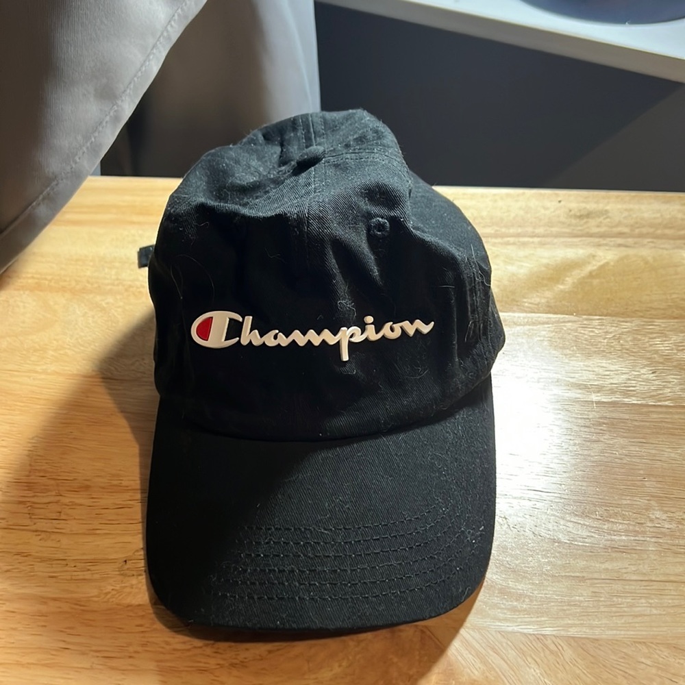 Black champion strapped hat, worn once.